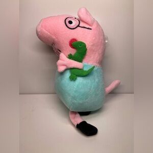 Peppa Pig suction plush. Daddy pig with dinosaur